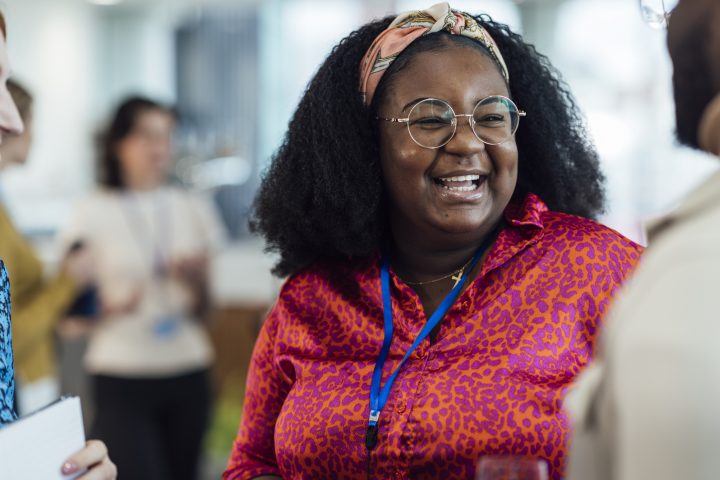 Woman is smiling at a new business acquaintance