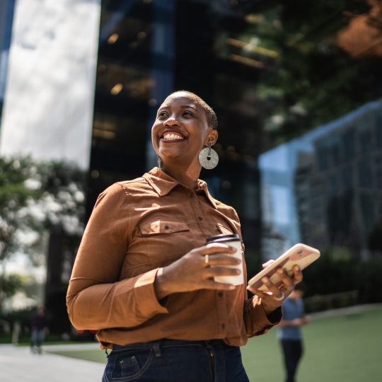 Brown woman wearing business attire