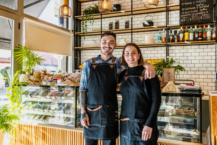 Portrait of bakery owners couple