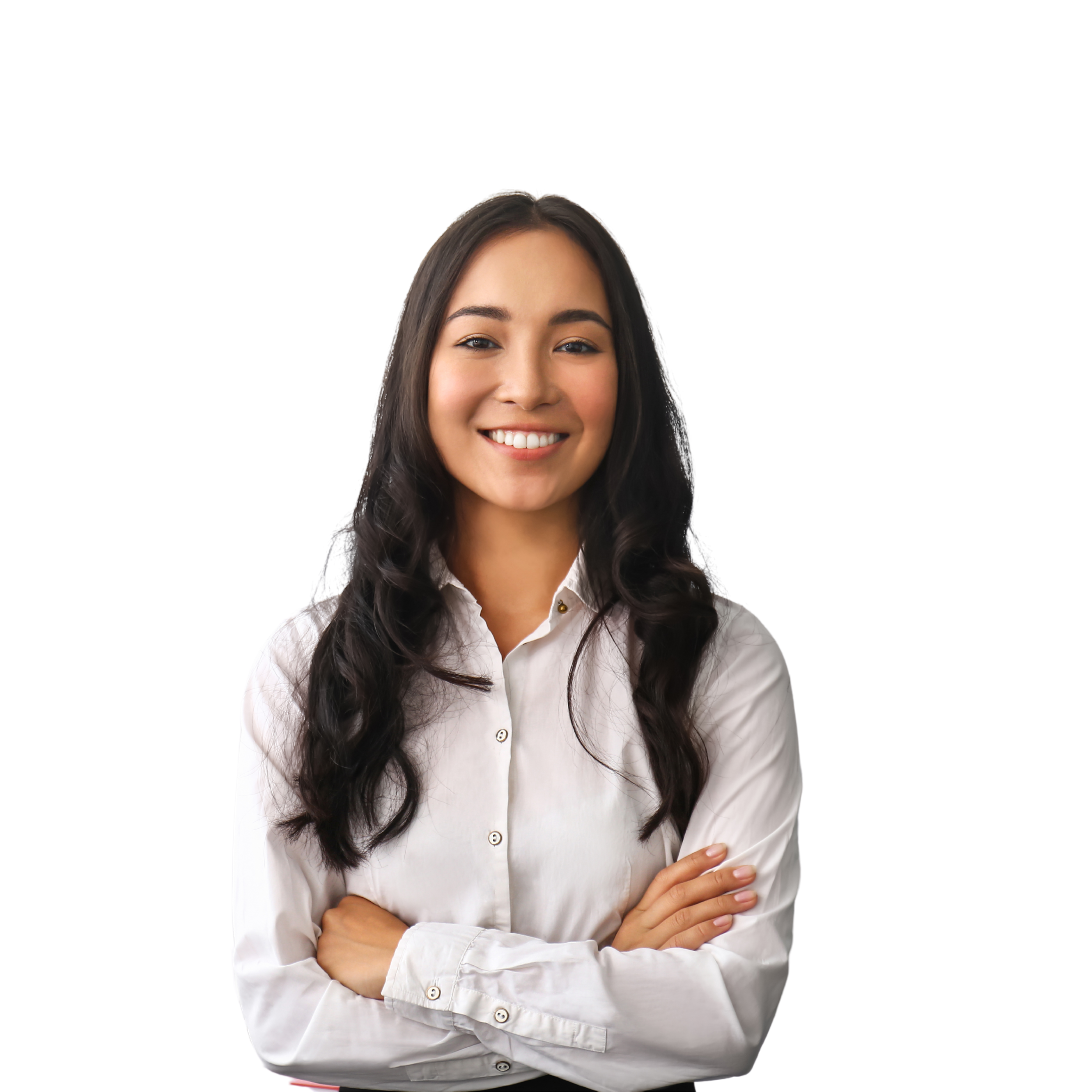 Smiling woman in business attire facing the camera with arms crossed