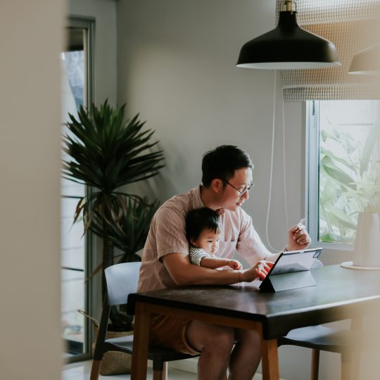 Girl with dad working