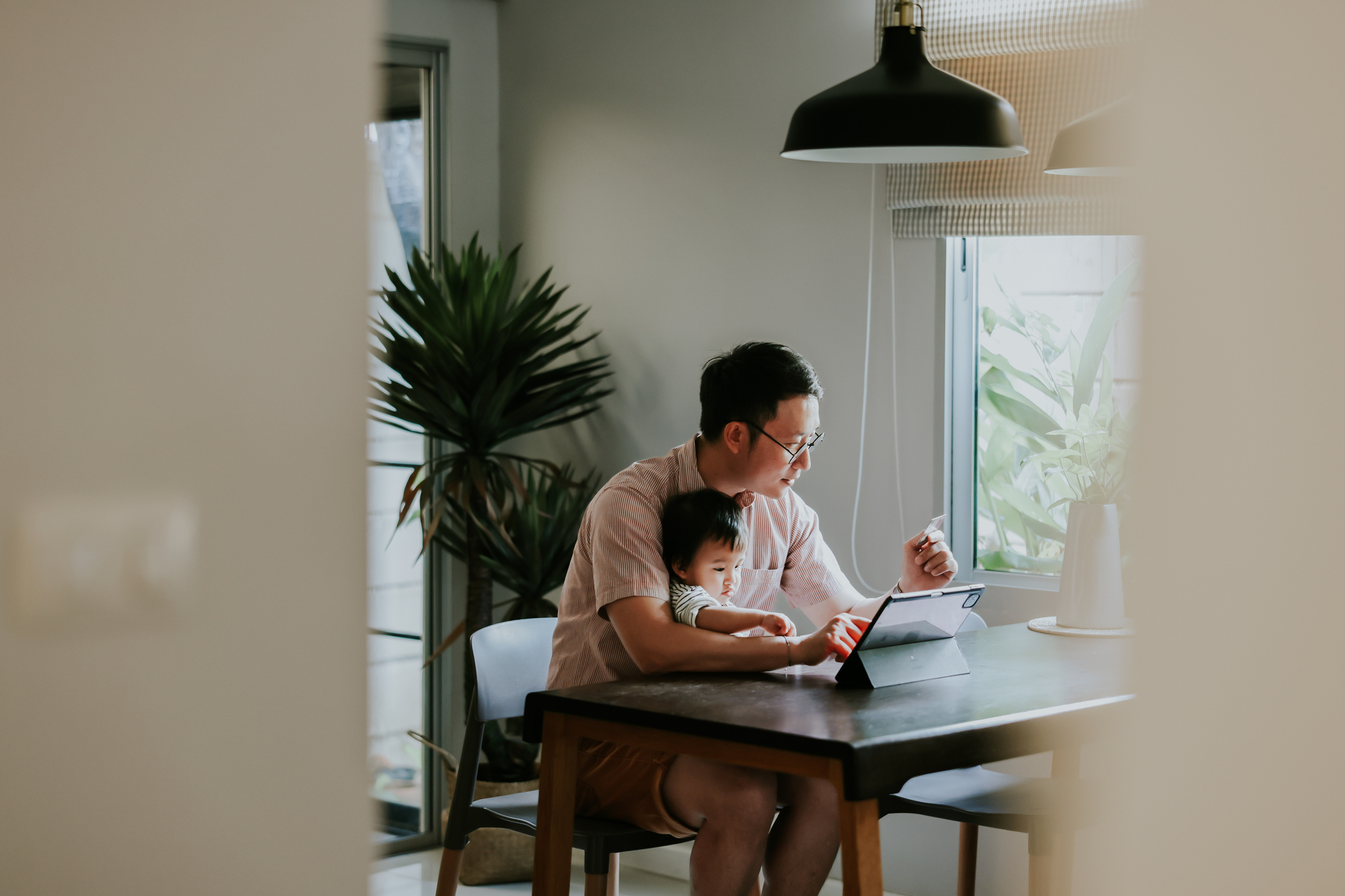 Girl with dad working