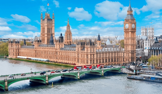 A wide shot of a large parliament building
