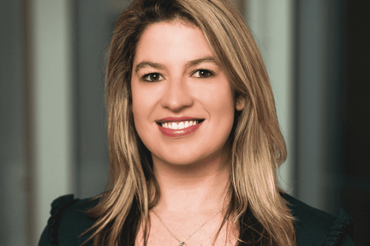 woman smiling in black shirt
