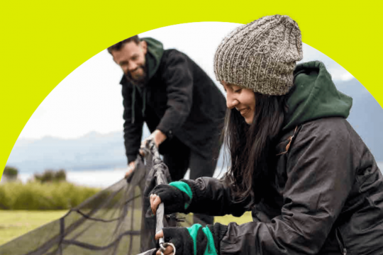 image of women and man outdoor picking up net